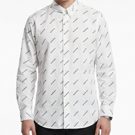 Man wearing a white shirt with black patterns and black pants on a white background