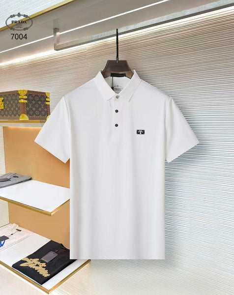 White polo shirt on a hanger with a blurred background