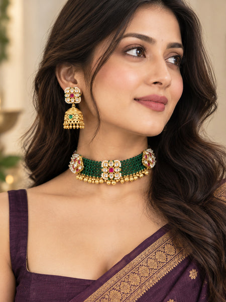 Traditional Golden Polki Jhumka Earrings with Green and Ruby Stone Detailing