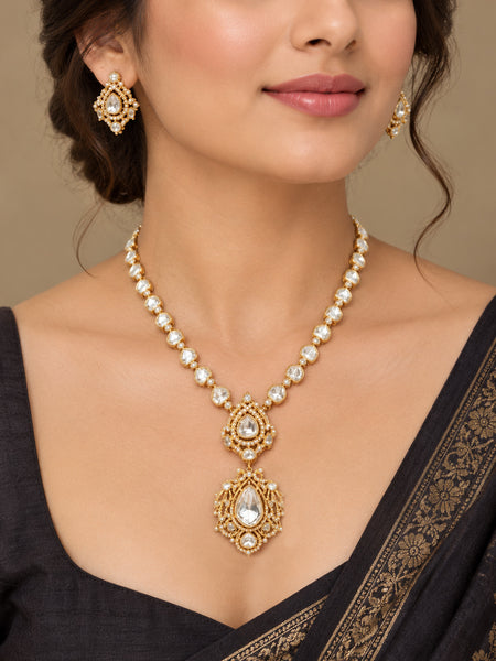 Elegant Golden Polki Necklace Set with Statement Pendant and Matching Earrings