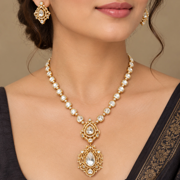 Elegant Golden Polki Necklace Set with Statement Pendant and Matching Earrings