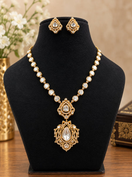 Elegant Golden Polki Necklace Set with Statement Pendant and Matching Earrings