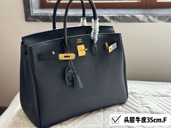 Elegant Taupe Leather Structured Handbag with Gold-Tone Hardware