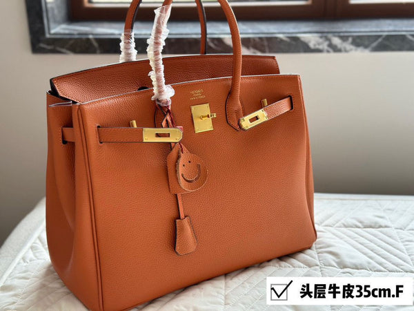 Elegant Taupe Leather Structured Handbag with Gold-Tone Hardware