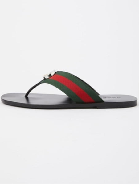 Stylish Black Flat Sandals with Signature Stripe Strap & Gold Logo Detail
