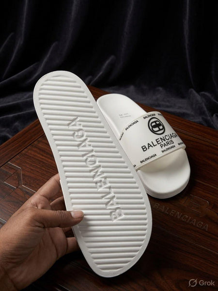 White Cushioned Slide Sandals with Bold Black Graphic Design