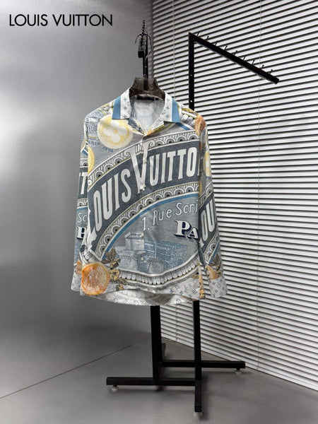 Premium brand men's long sleeve shirts in orange and blue colorways featuring 1 Rue Scribe Paris heritage graphic print with LV monogram pattern on display stands